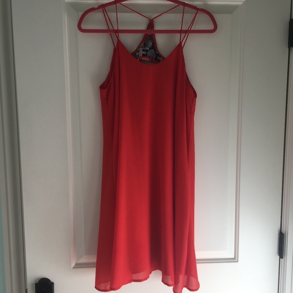 STUNNING RED DRESS WITH STRAPPING AND BACK DETAILS